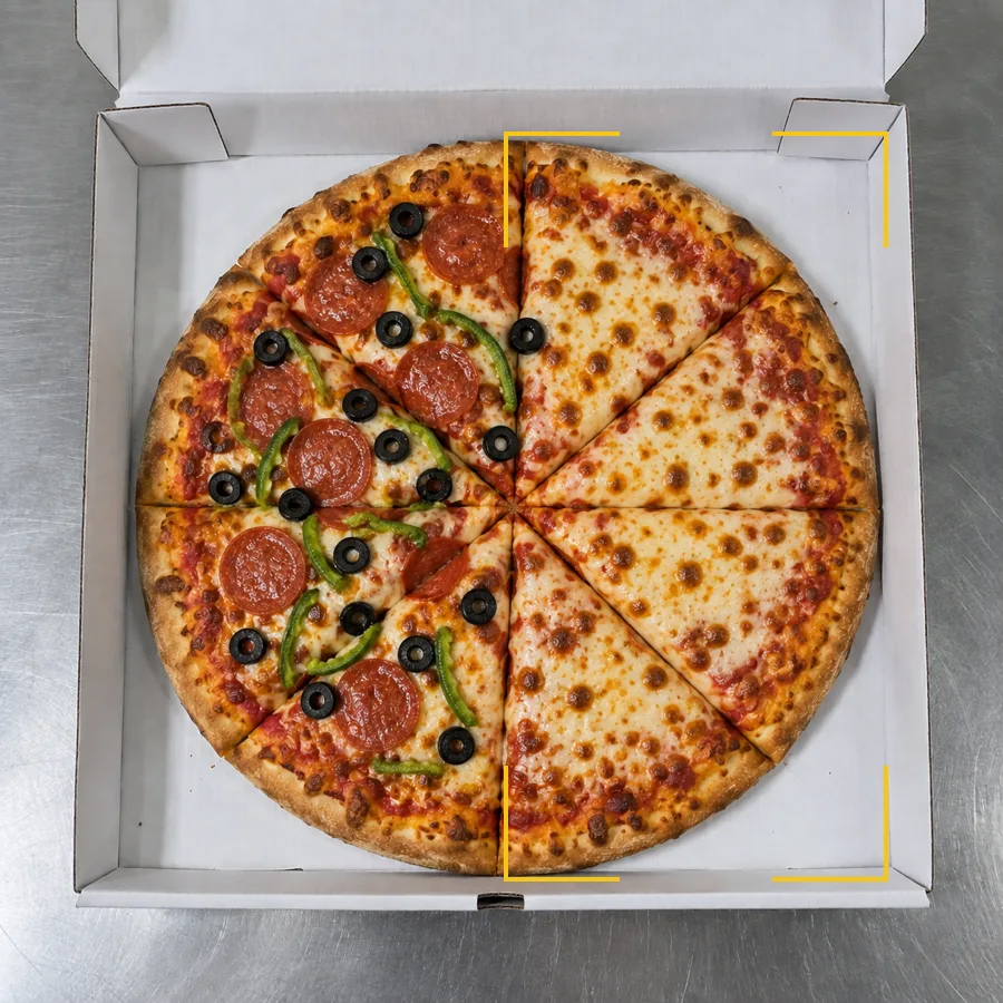 The same pizza with every topping on one half and the other half bare cheese. Product check at the prep station.